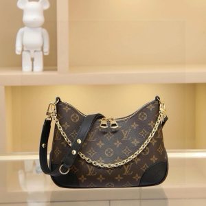 Alternative view of The compact handbag evokes vintage charm with Monogram canvas and reinforced leather trim. An adjustable strap allows for shoulder or crossbody carry, while a smooth zipper opening provides easy access to essentials. Dimensions: 27.0 x 16.0 x 10.0 cm